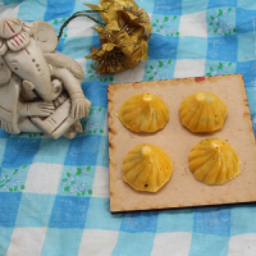 Pineapple Chocolate Modak 1 kg (Approx 80 - 85 pcs)