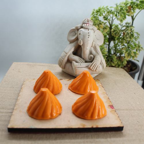 Orange Chocolate Modak 1 kg ( Approx 80 - 85 pcs)